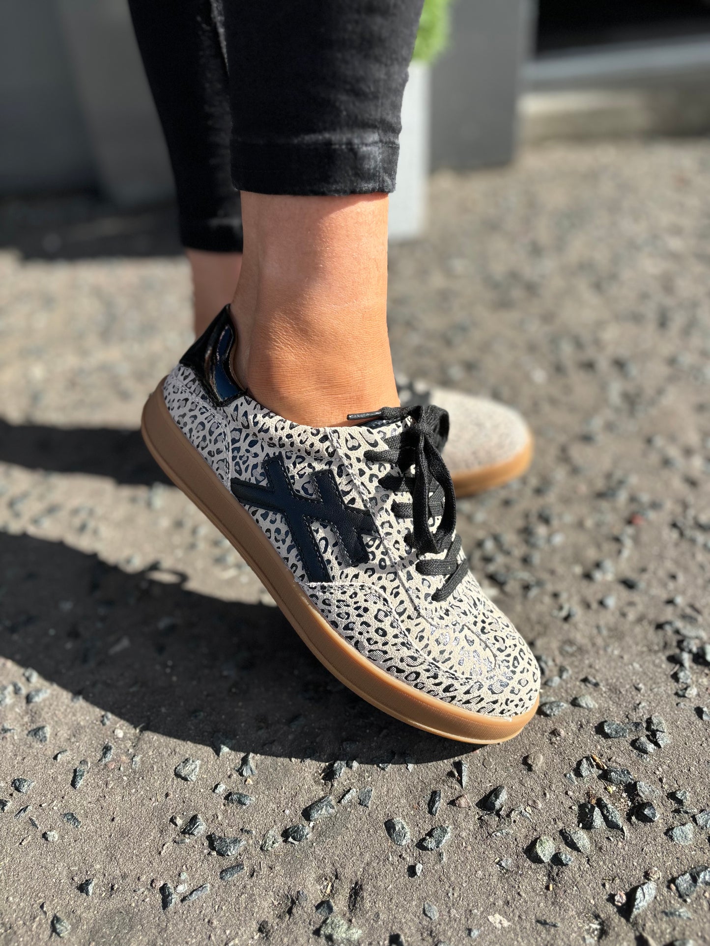 Sixty Five Leopard Trainers